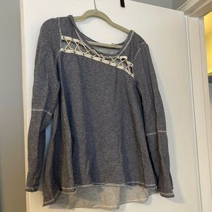 Free people fleece top size M in stripes with laces detail.